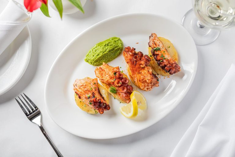 Grilled octopus with potatoes and green vinaigrette