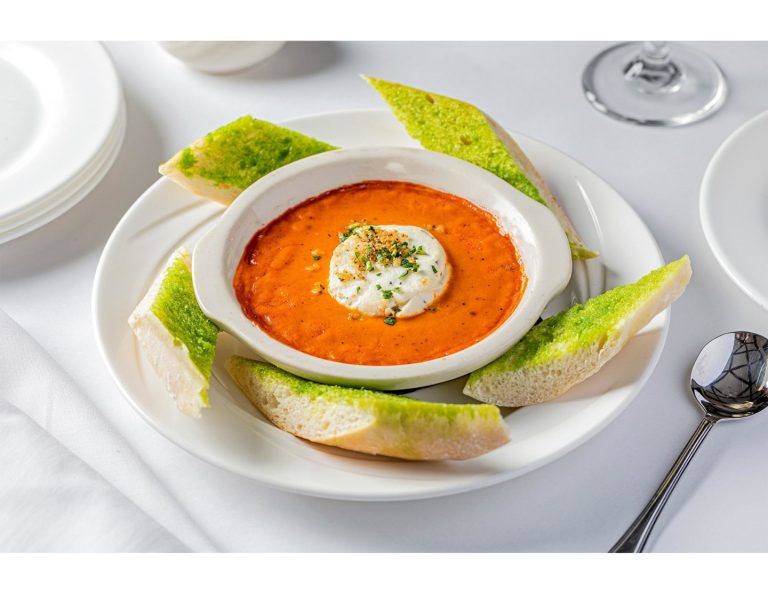 Oven-baked goat cheese in tomato basil sauce