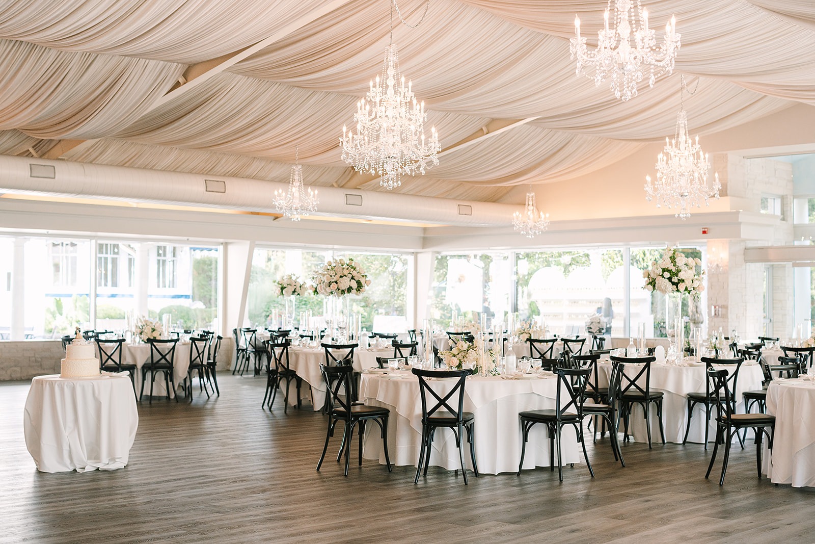 The Pavilion - draped ceiling, crystal chandeliers and floor-to-ceiling windows onto the grounds
