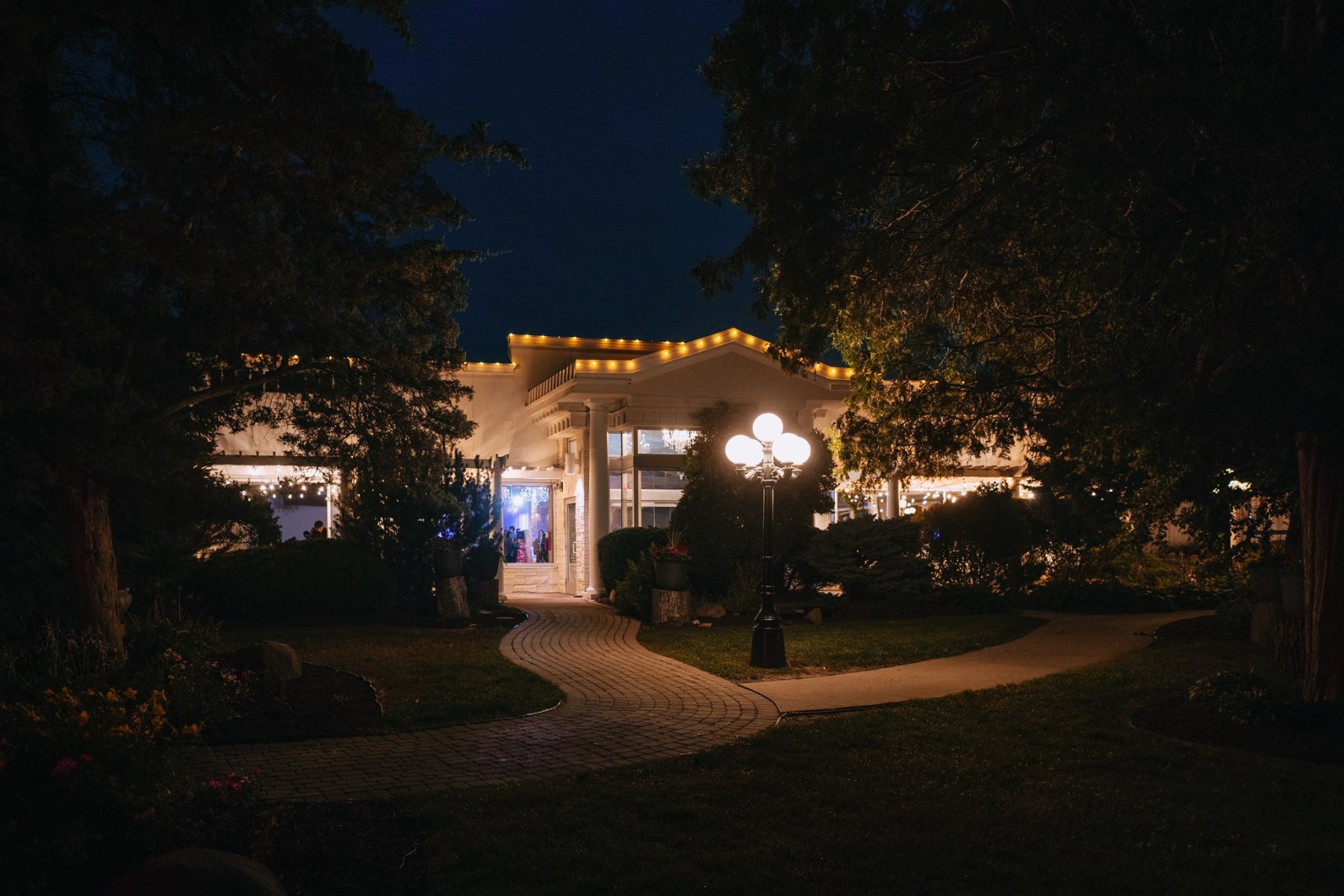 The mansion lit up after dark