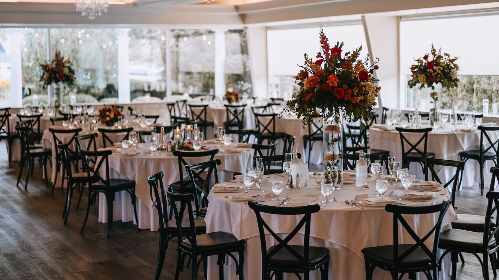 The Pavilion - draped ceiling, crystal chandeliers and floor-to-ceiling windows onto the grounds